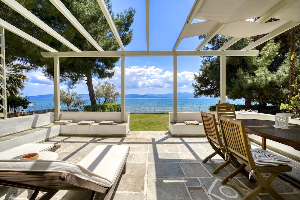Salt Stone Beach Front Retreat by Estia