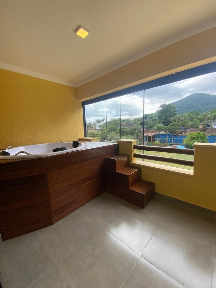 Jacuzzi Privativa com AC em Maresias