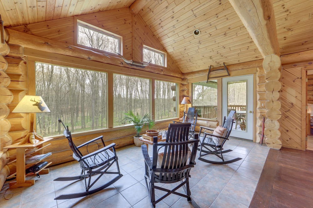 Cadillac Vacations - Rustic Tustin Cabin on 7 Acres w/ Fire Pit  Porch - Property Image 1