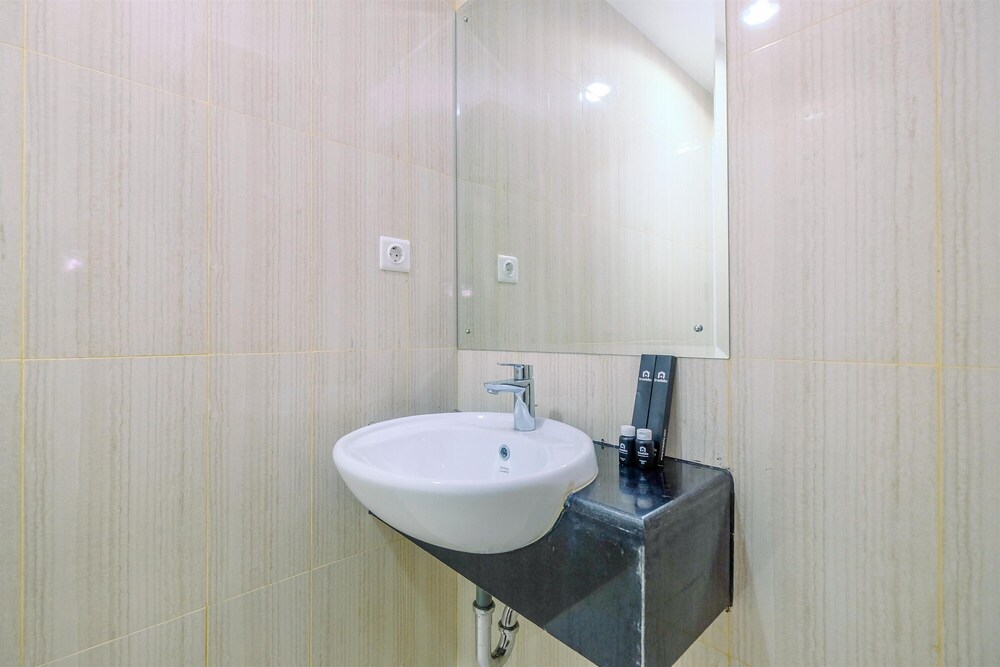Homey 2BR at Sentul Tower Apartment