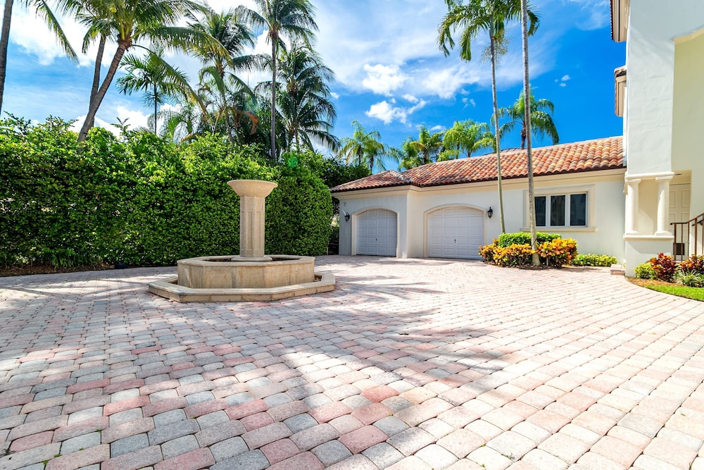 Waterfront Mansion With Game Room Gym Media Room and Guest House