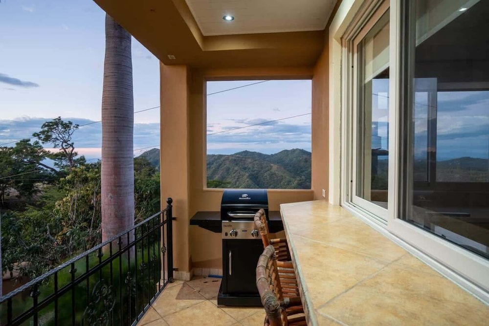 Stunning Mountaintop Property with Stylish Main Home, Private Guesthouse & Infinity Pool