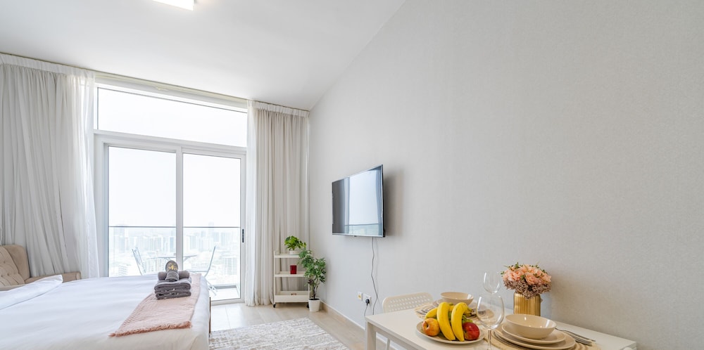 Marco Polo - Spacey Studio With Balcony at JVC | Pool & Gym
