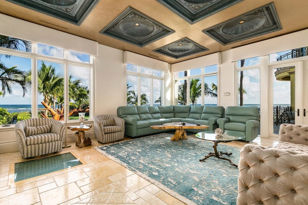 Luxurious 3-story Estate With Gym Pool Slide Private Beach and Lighthouse Views