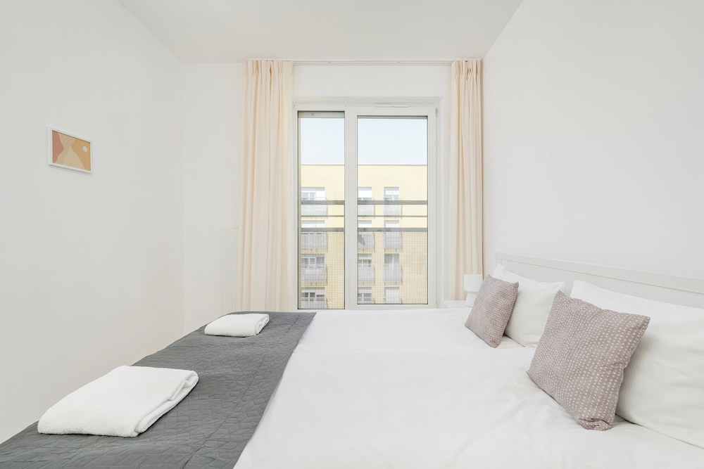 Wroclaw Dark Blue Apartment by Renters