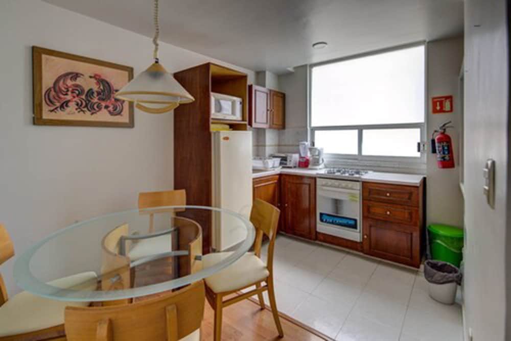 G K Suites Duraznos