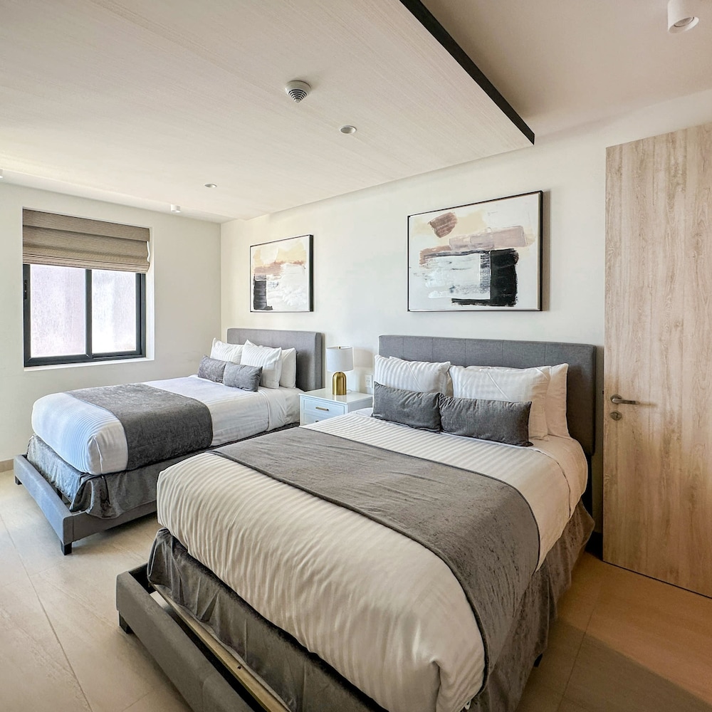 Brand-new Modern 2BR Gem on Iconic Sandy Beach