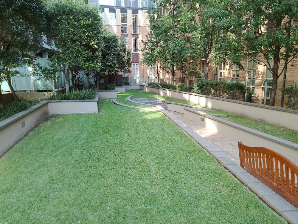 Unwind in Style at Melbourne's Historic Art Deco Apartment With Pool Gym Carpark