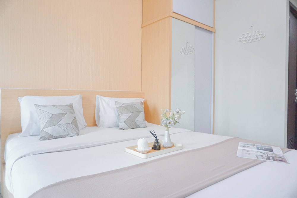 Cozy Stay and Strategic Studio Apartment at Grand Dhika City