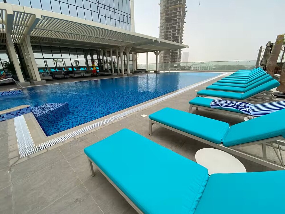 Vogue Novotel JVT near Springs Souk Mall