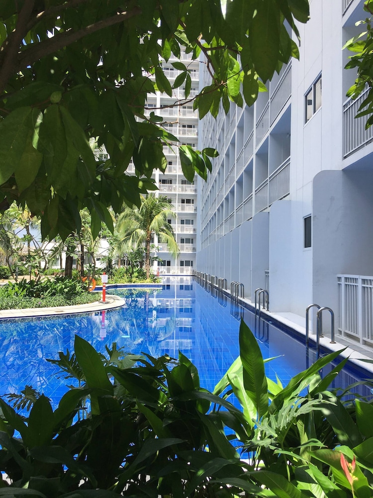 Relax in Pasay City's Best Kept Secret - Spacious Condo With Garden View