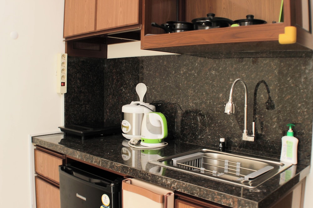 Nice and Comfort 1BR with Extra Room at Podomoro Golf View Apartment