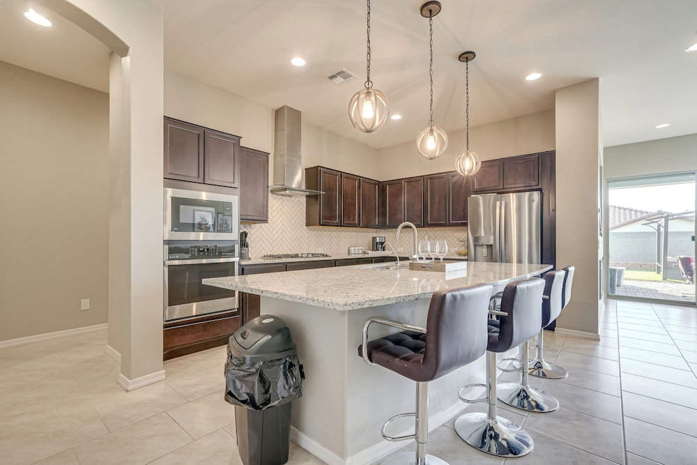 Covered Patio & Community Pool: Home in Surprise