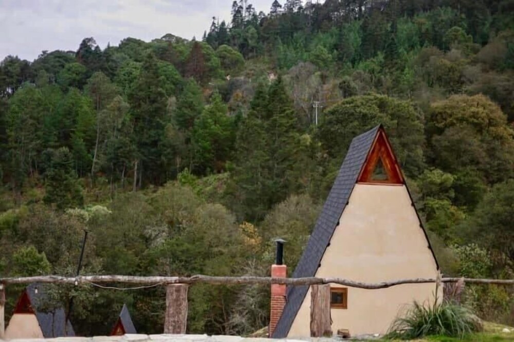 NIDU Cabañas & Holística view 4