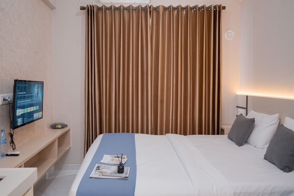 Simply And Cozy Studio Room At Sky House Bsd Apartment