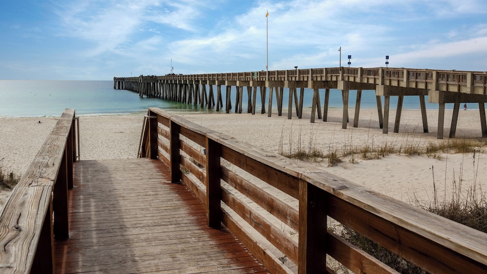 Beachside Stay w/ Pool & Beach Access + Free Attraction Tickets!