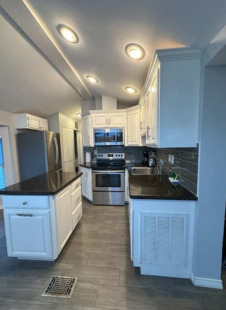 Stylish 2BR Waterfront Home w Pool Resort Access