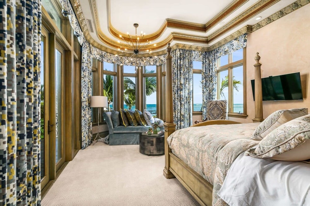 Luxurious 3-story Estate With Gym Pool Slide Private Beach and Lighthouse Views