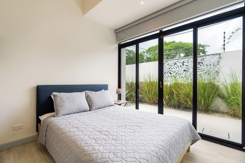 Sprawling Modern Property with a Tranquil Outdoor Living Space, swimming pool, and a private Casita