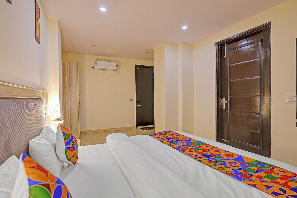 Fabhotel Orchid White Inn