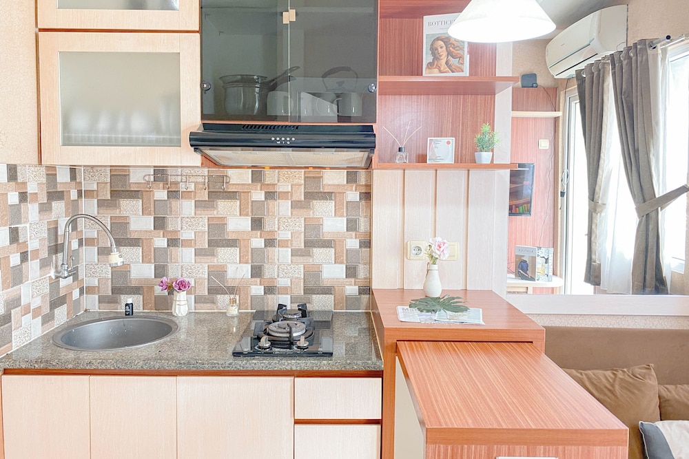 Simple Style 2Br At Green Pramuka City Apartment