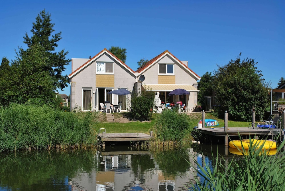 Nice Holiday Home on the Water in Friesland
