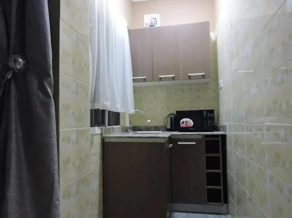 Wig and Gown Apartment