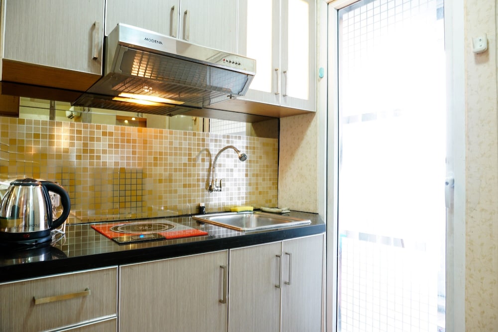 Furnished Studio with Comfortable Design Green Pramuka Apartment view 5