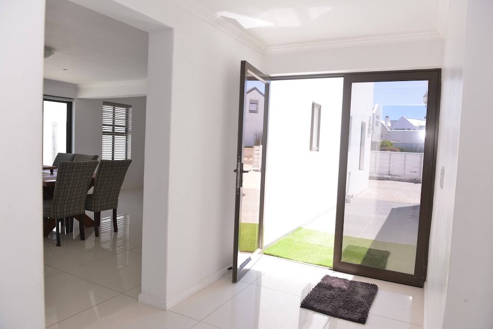 Pelican Cove is a Modern 4-bedroom Holiday Home in Langebaan With Some Sea Views