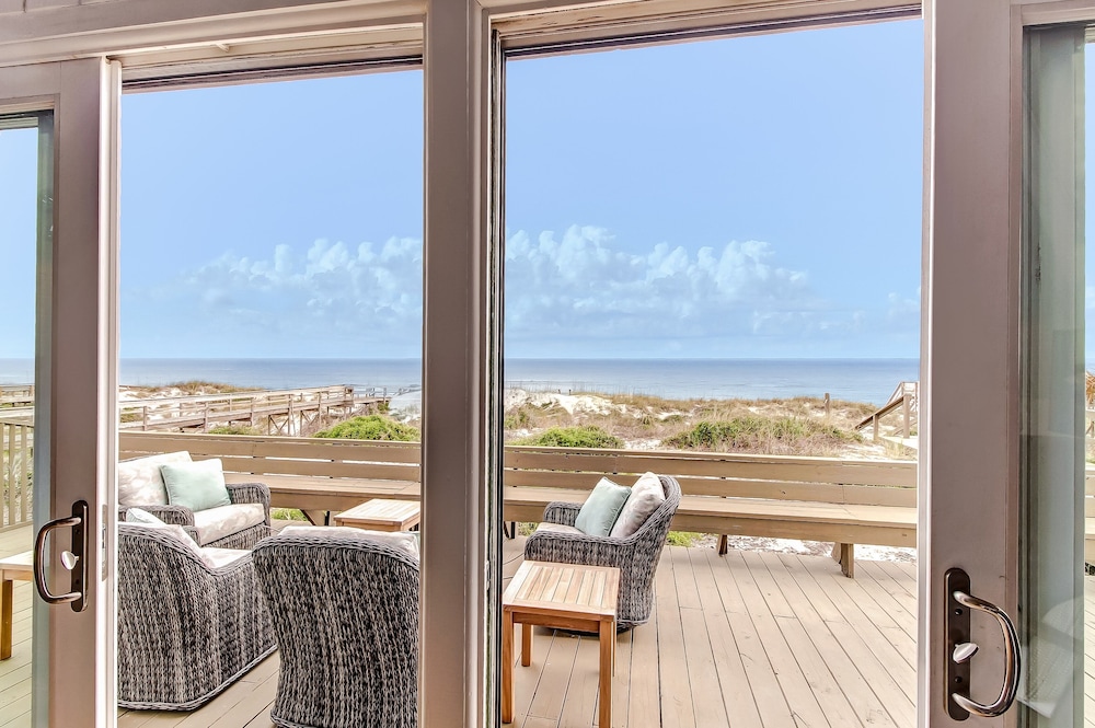 Roomy Chalet-Style Beachfront Condo with Private Beach Access by RedAwning