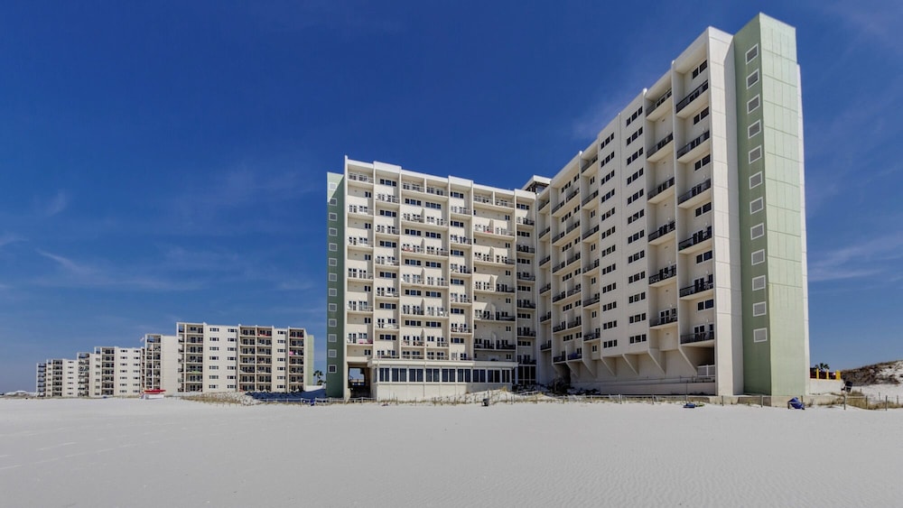 Beachfront Charm Meets Lake Life + Free Tickets: Dolphin Cruise & More!