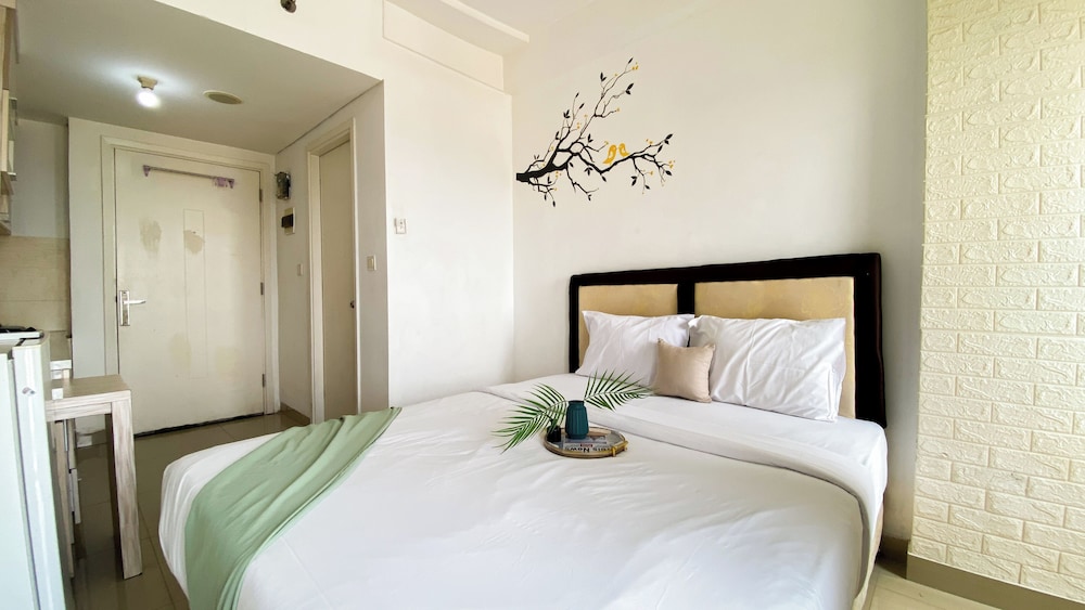 Homey And Cozy Living Studio At Poris 88 Apartment