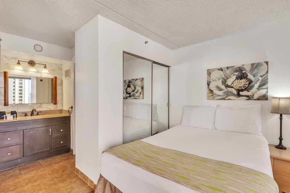 Waikiki Banyan Condo Located One Block From Waikiki Beach! by Koko Resort Vacation Rentals