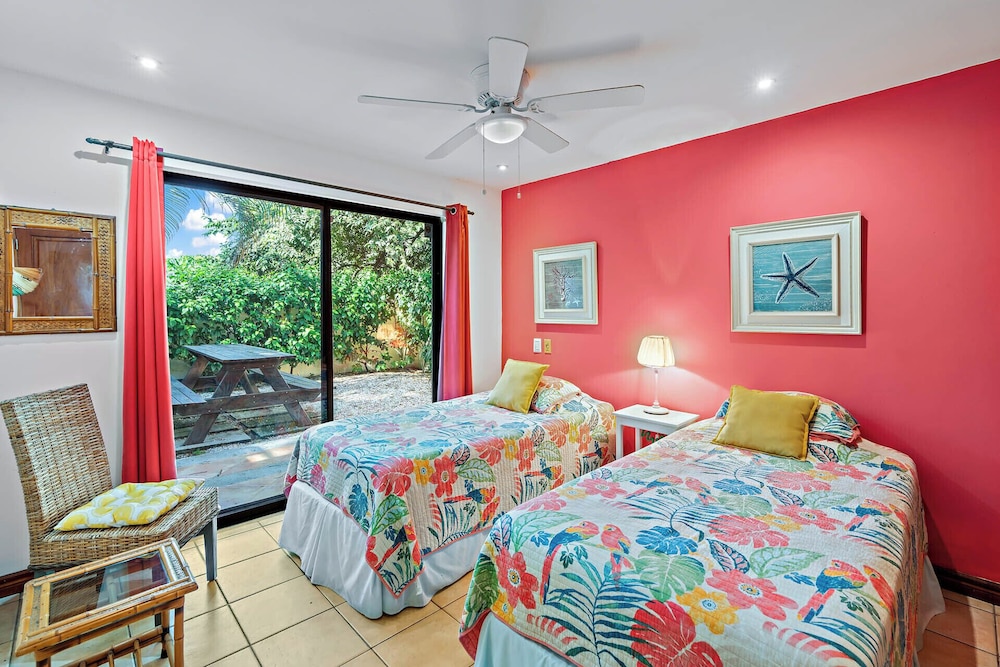 Inviting Home with Colorful Decor and Private Backyard Oasis with a Swimming Pool & Shaded Terrace
