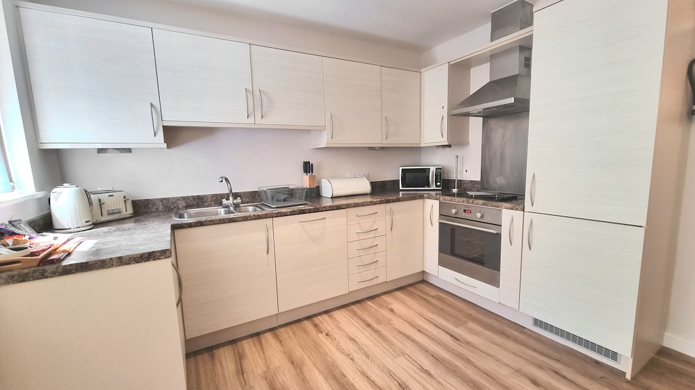 The Beach House & Porth Sands Apartments