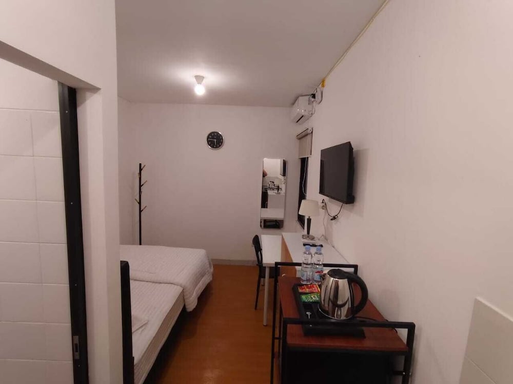 Golden Knight Suites | EcoHome Apartment