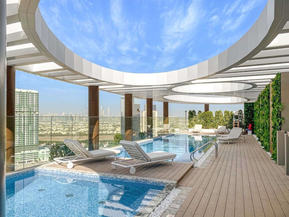 Luxurious Stay in JVC With Rooftop Pool Gym