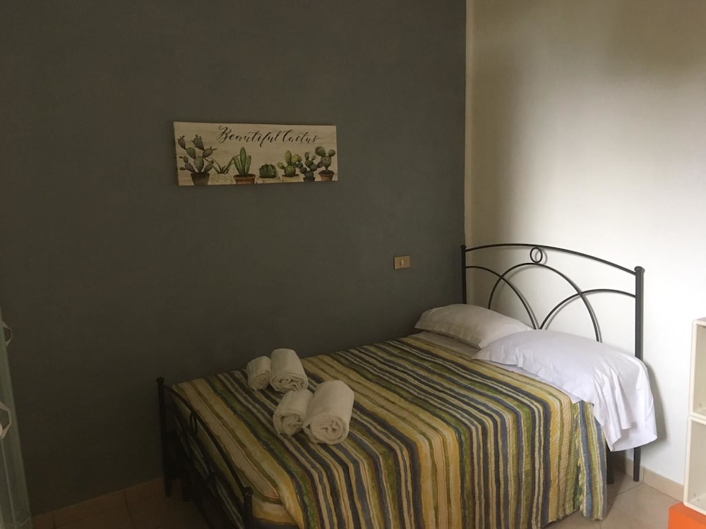 Sapienza Time en Siena — hotel room