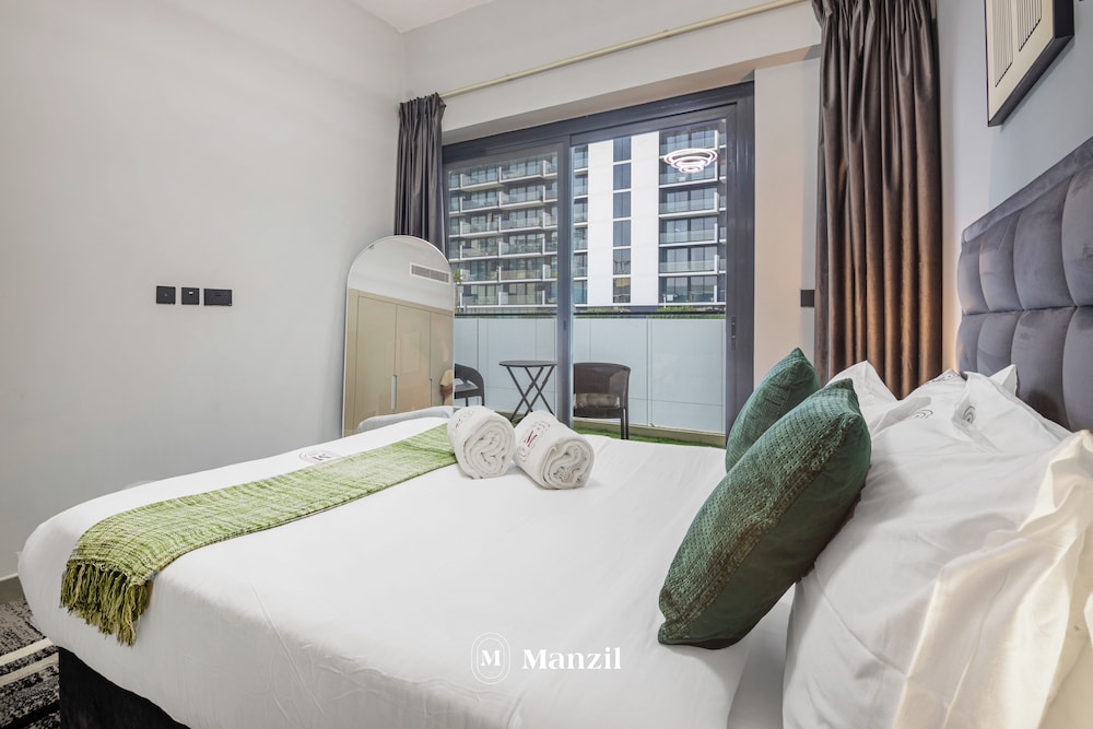 Manzil-Stylish 1BR with Maid room in JVC