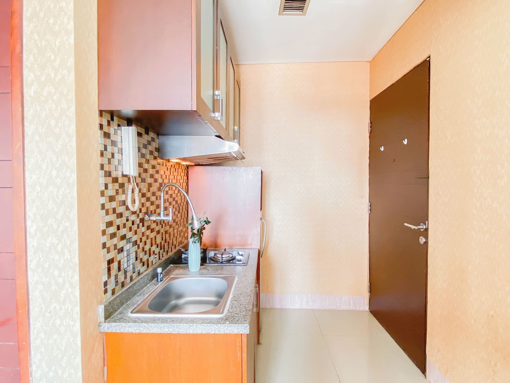 Warm Wood Accents Studio At Mangga Dua Apartment
