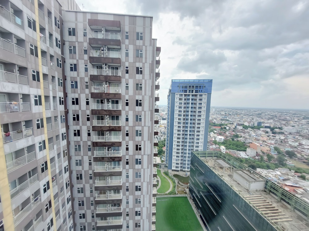 Good Place And Homey 2Br At Podomoro City Deli Medan Apartment