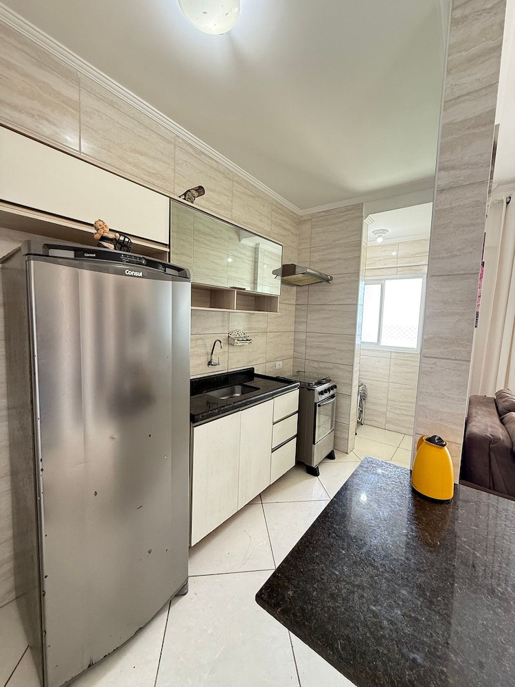 Pé na Areia Praia do Maracanã II