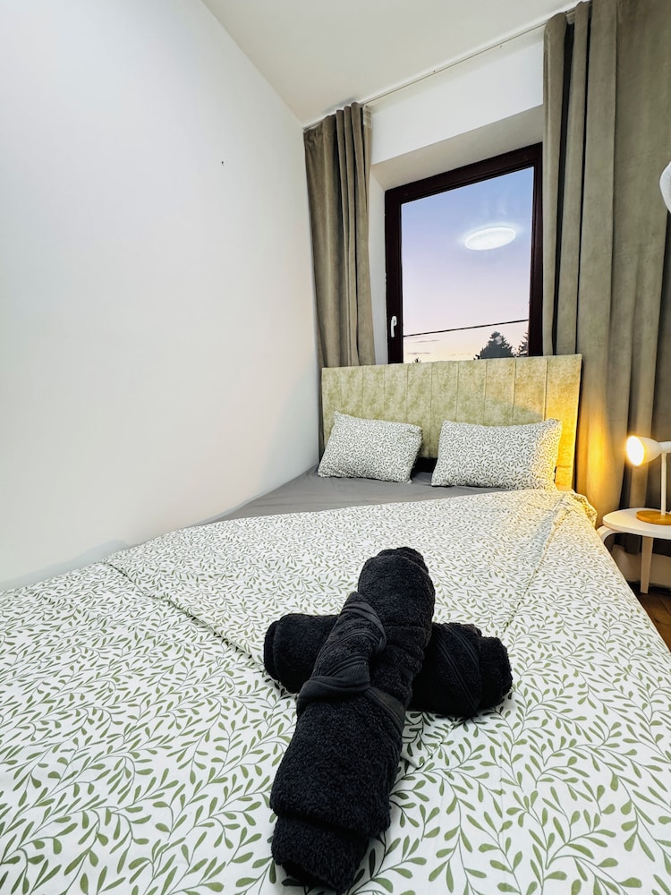 Central 8BR Stay with Garden and Terrace