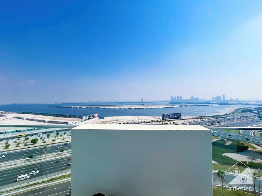Cozy 1BR With Balcony & Views in Azizi Fawad
