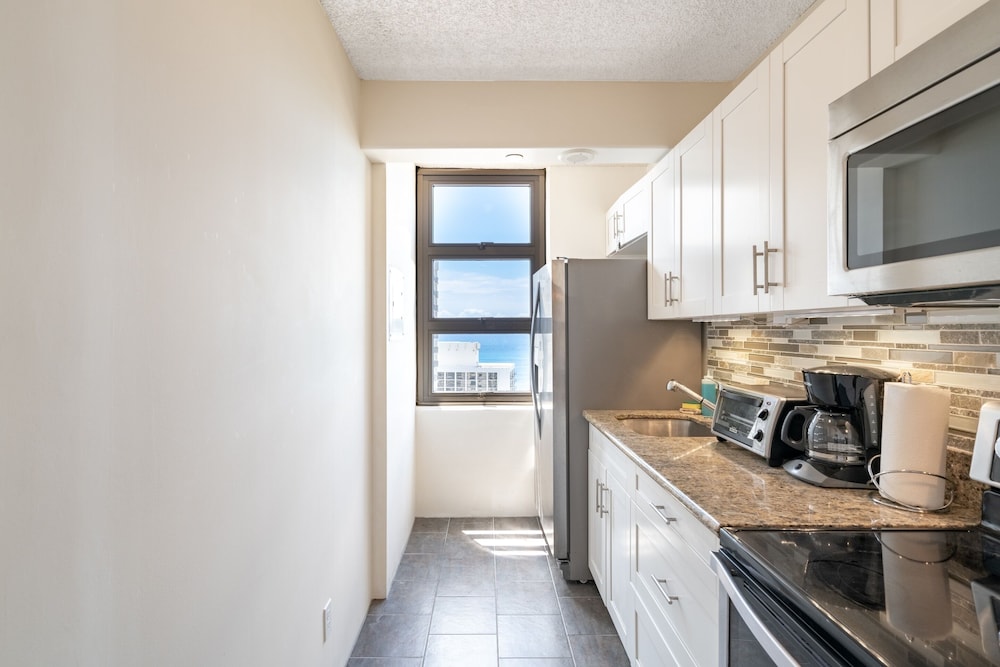 Waikiki Banyan Condo Located One Block From Waikiki Beach! by Koko Resort Vacation Rentals