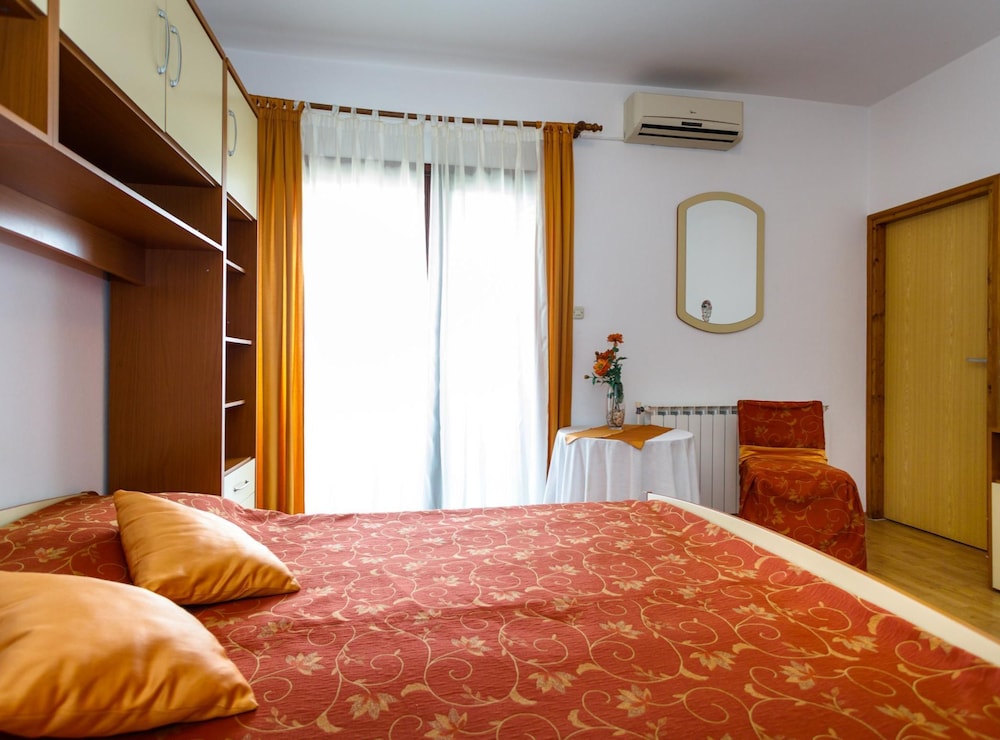 Sunny and Sleek Krk Rooms With Balcony