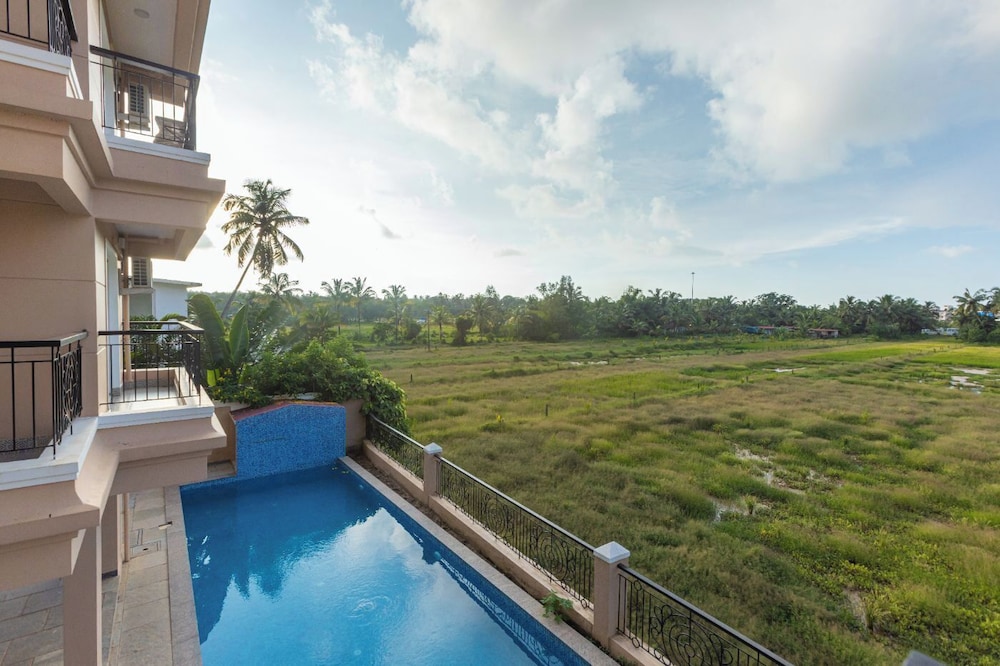 Palm Retreat 1BHK Pool & Field Views