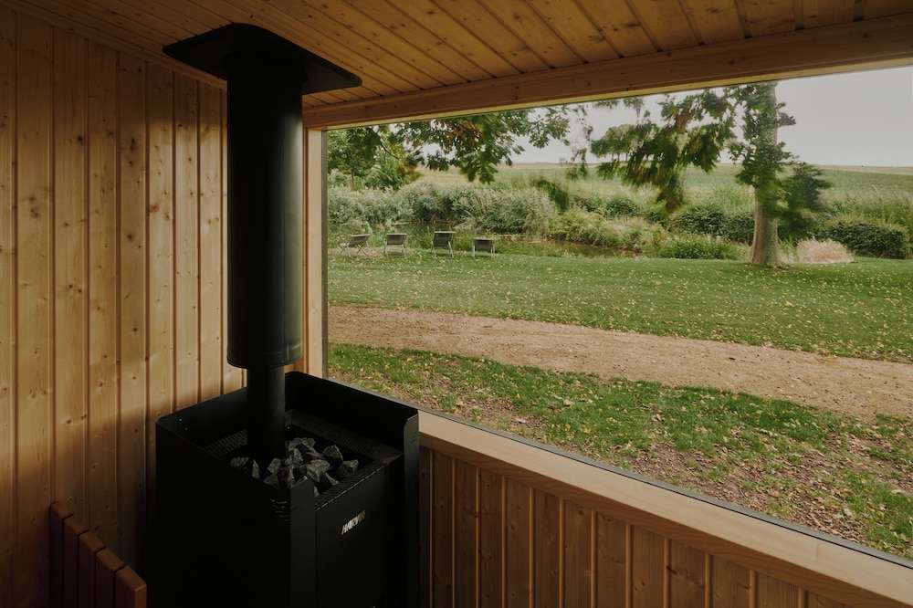 Raus | Cabins mit Feldblick + Saunazugang