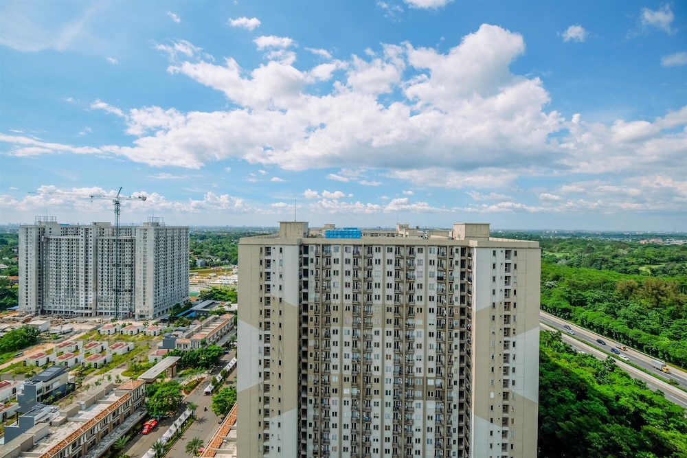 Minimalist and Warm 2BR at 29th Floor Podomoro Golf View Apartment