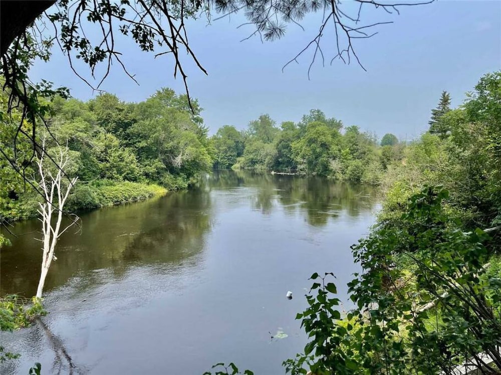 Whispering Pines Riverside Getaway